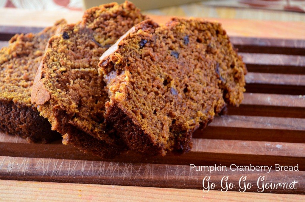 This pumpkin bread is flavored with citrus and studded with cranberry, for a truly unique fall treat! | Go Go Go Gourmet