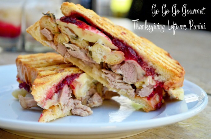 Thanksgiving recipes, leftover panini cut in half on a white plate