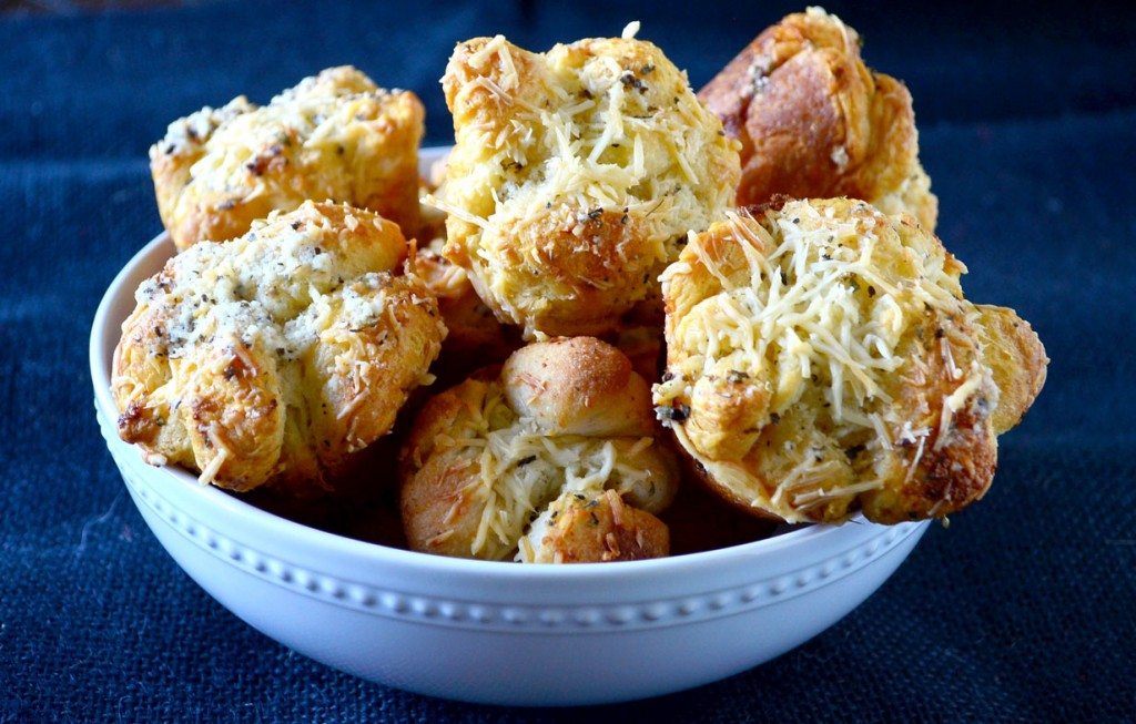 Store bought dough re-imagined to make these delectable dinner rolls, brimming with cheese and herbs. | Go Go Go Gourmet