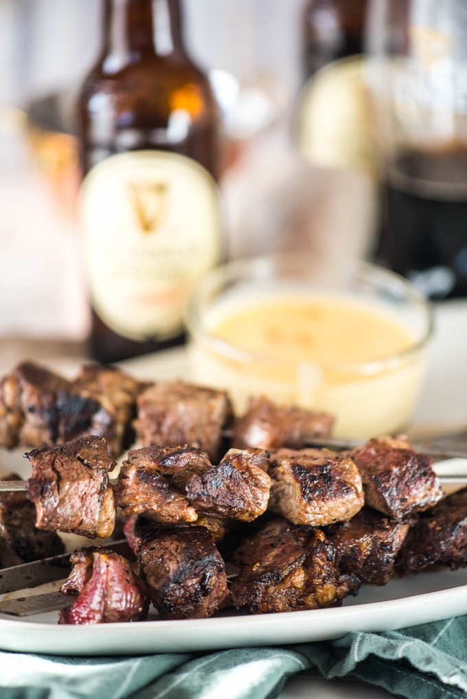 Guinness glazed steak skewers with smoked gouda fondue