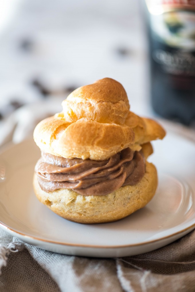 Cream puff recipe filled with Irish cream filling on white plate