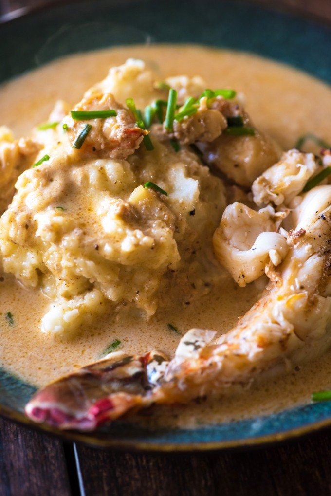 Close up of lobster mashed potatoes with a lobster tail