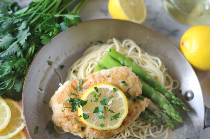 Chicken Francese recipe with angel hair and asparagus in skillet