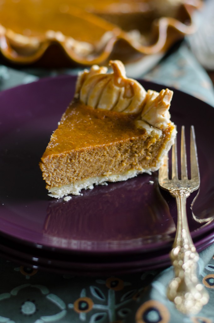 Slice of pumpkin chiffon pie on a purple plate