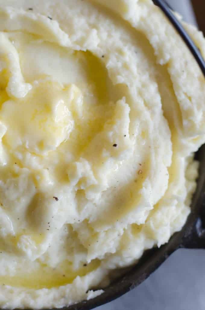 Close up of whipped potatoes in a skillet