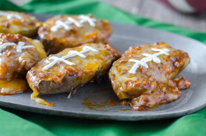 Chili Cheese Potato Skins- messy, cheesy and perfect for celebrating the big game! | Go Go Go Gourmet @gogogogourmet