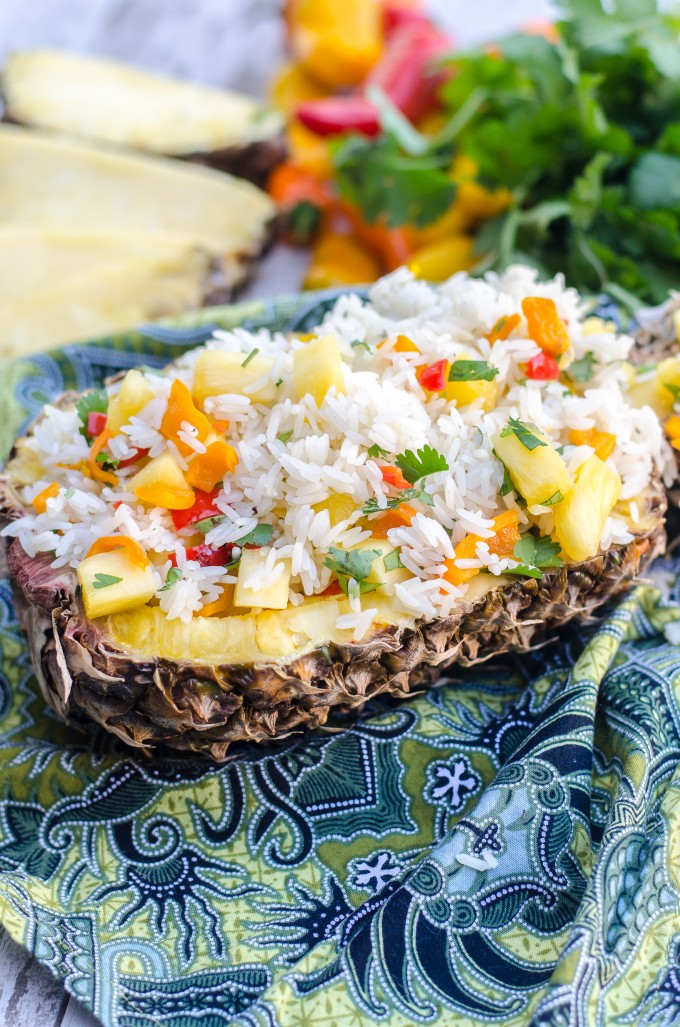This easy Tropical Pineapple Rice puts a twist on the classic Chipotle cilantro rice! Perfect for any weeknight meals, you can even serve it in a pineapple bowl for fun! It would taste great with any Thai or Hawaiian chicken recipes, and makes a great healthy side dish! #gogogogourmet #pineapplerice #cilantrorice #tropicalpineapplecilantrorice