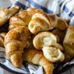 Thanksgiving recipes, crescent rolls in a basket with a blue and white towel