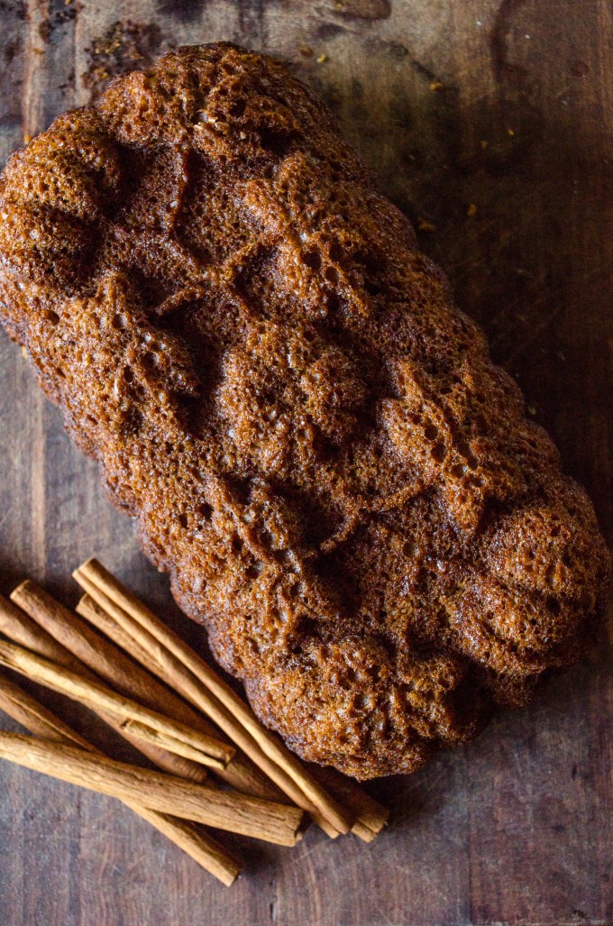 Pumpkin bread loaf on a cutting board