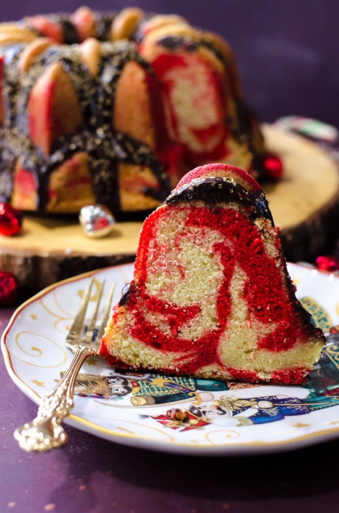 Chocolate peppermint cake cut into a slice on a plate with a fork