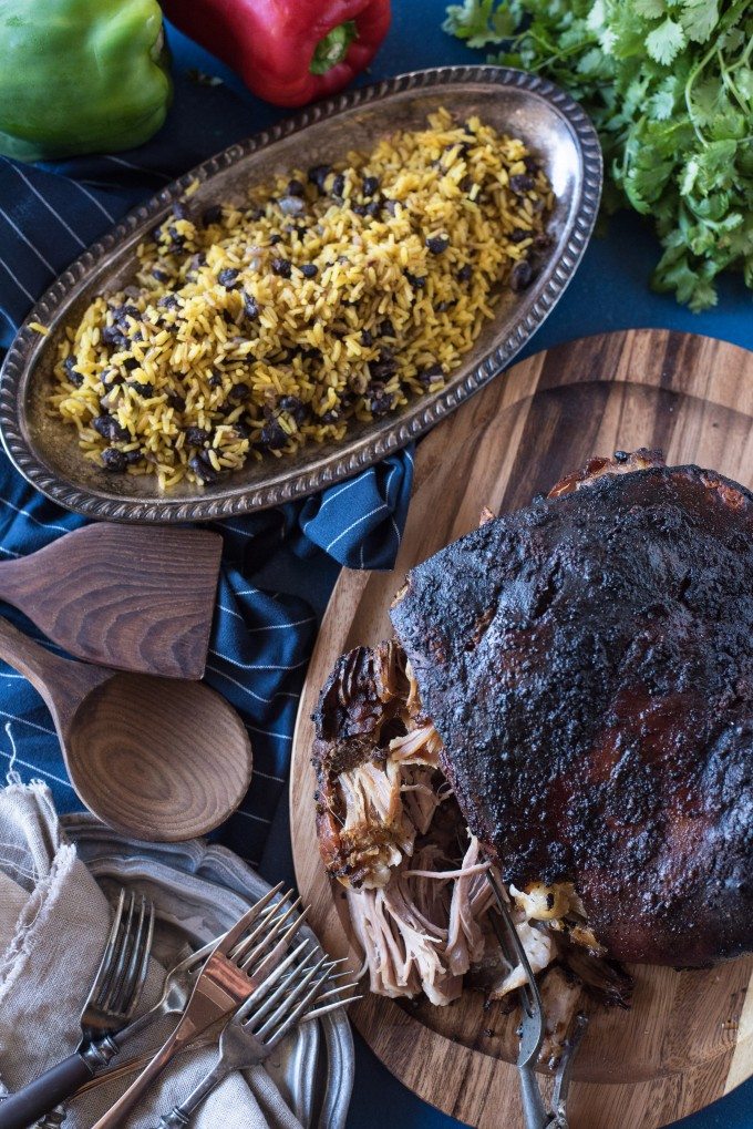 Overhead shot of Pernil with yellow rice and beans