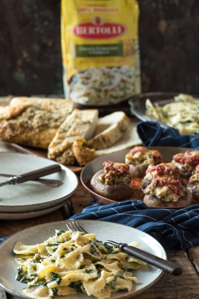 Sausage Stuffed Mushrooms with pasta and bread