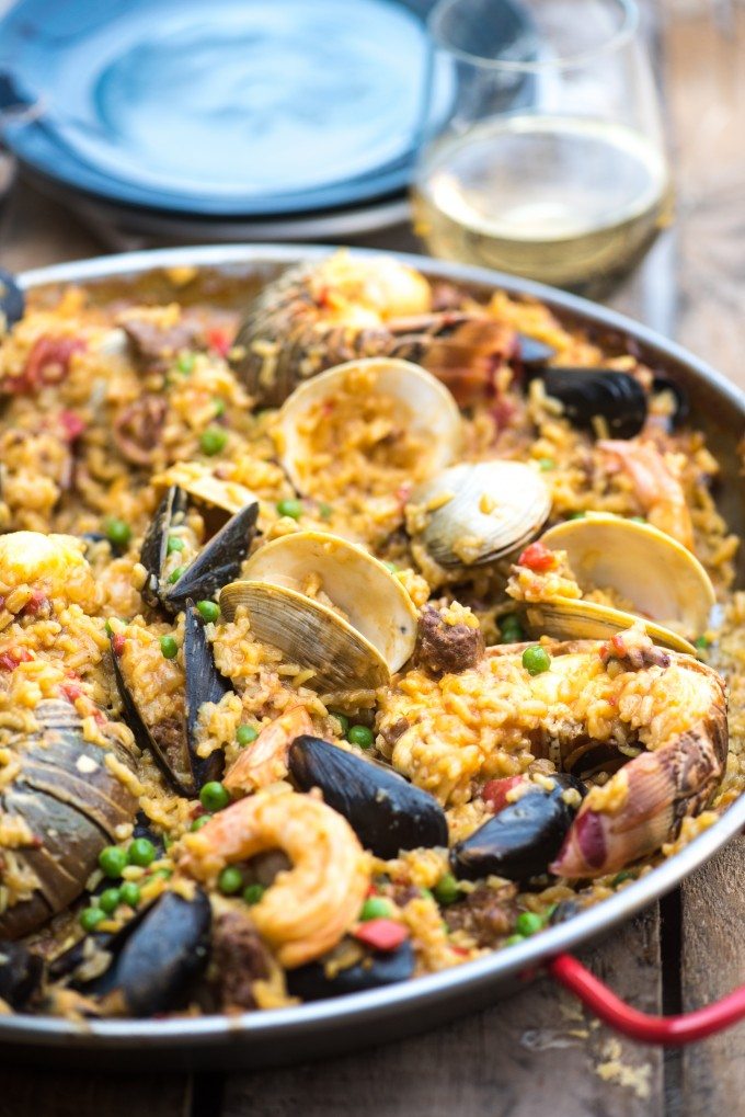 Seafood Paella- a dish packed with flavor! Chorizo, Shrimp, Lobster, Clams, Mussels, Calamari and More! | @gogogogourmet