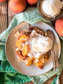 Slow Cooker Peach Cobbler Cake is the best and easiest way to use up summer's amazing peaches. No oven required! | @gogogoggourmet