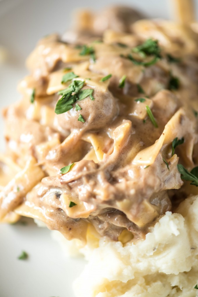 Amish Beef and Noodles is served over mashed potatoes | @gogogogourmet