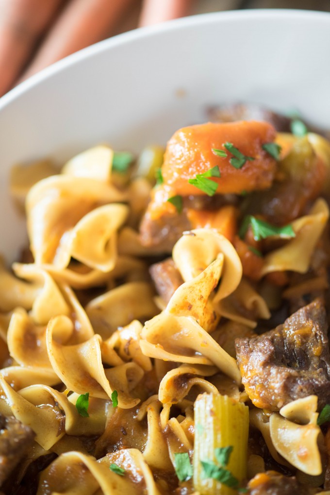 This Instant Pot Beef Stew Pasta is fabulous way to combine the flavors of warm and comforting beef stew with the heartiness of beef and noodles. | @gogogogourmet