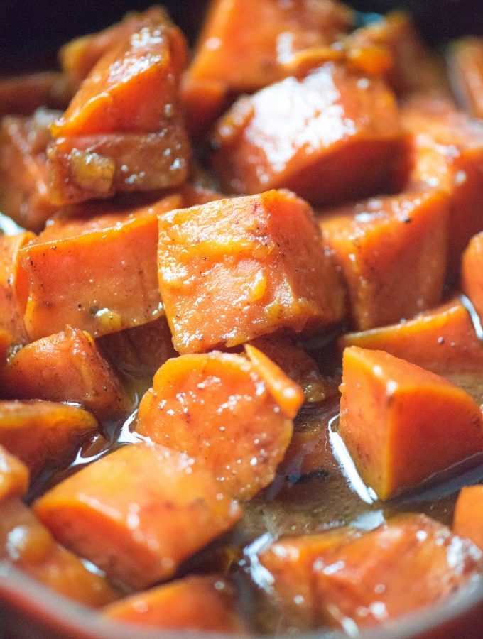 Candied sweet potatoes in a baking pan