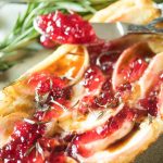 Apple brie puff pastry tart with a knife as thanksgiving sides