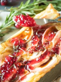 Apple brie puff pastry tart with a knife as thanksgiving sides