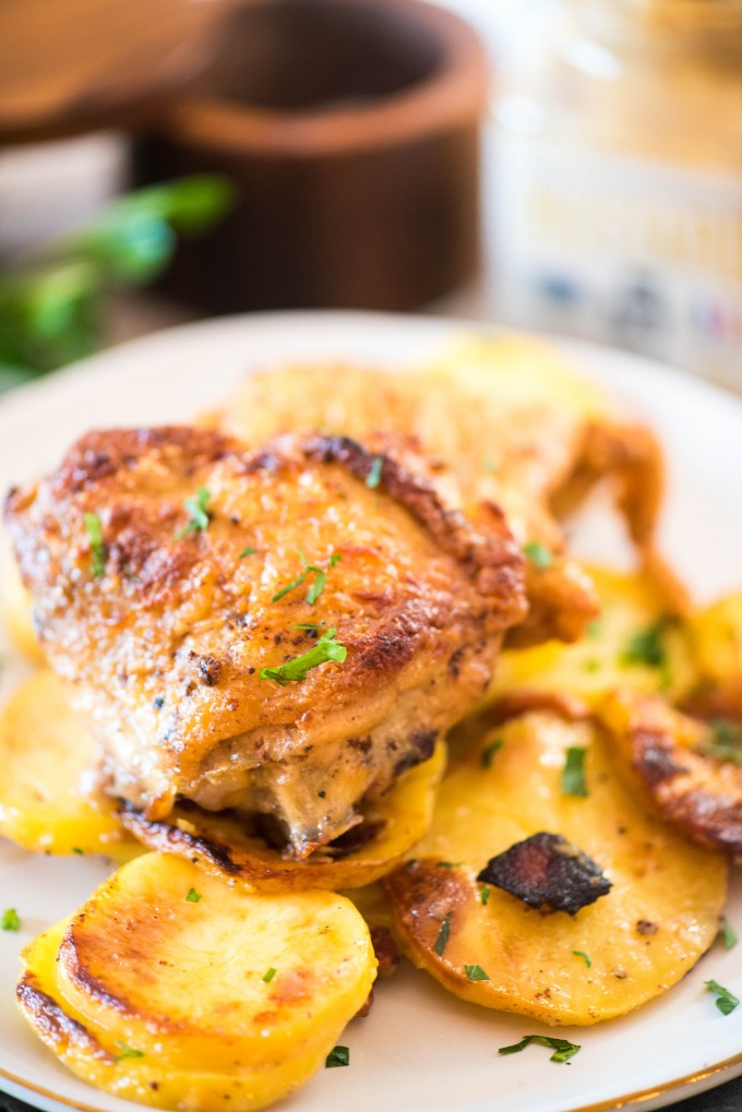 Crispy Sheet Pan Baked Chicken Thighs Recipe with Potatoes, Bacon and Creamy Mushrooms Sauce 