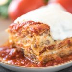 Easy lasagna recipe full of sausage, ricotta, and mozzarella