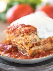 Easy lasagna recipe full of sausage, ricotta, and mozzarella