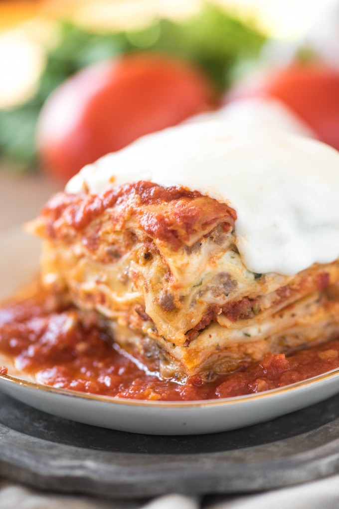 Easy lasagna recipe full of sausage, ricotta, and mozzarella