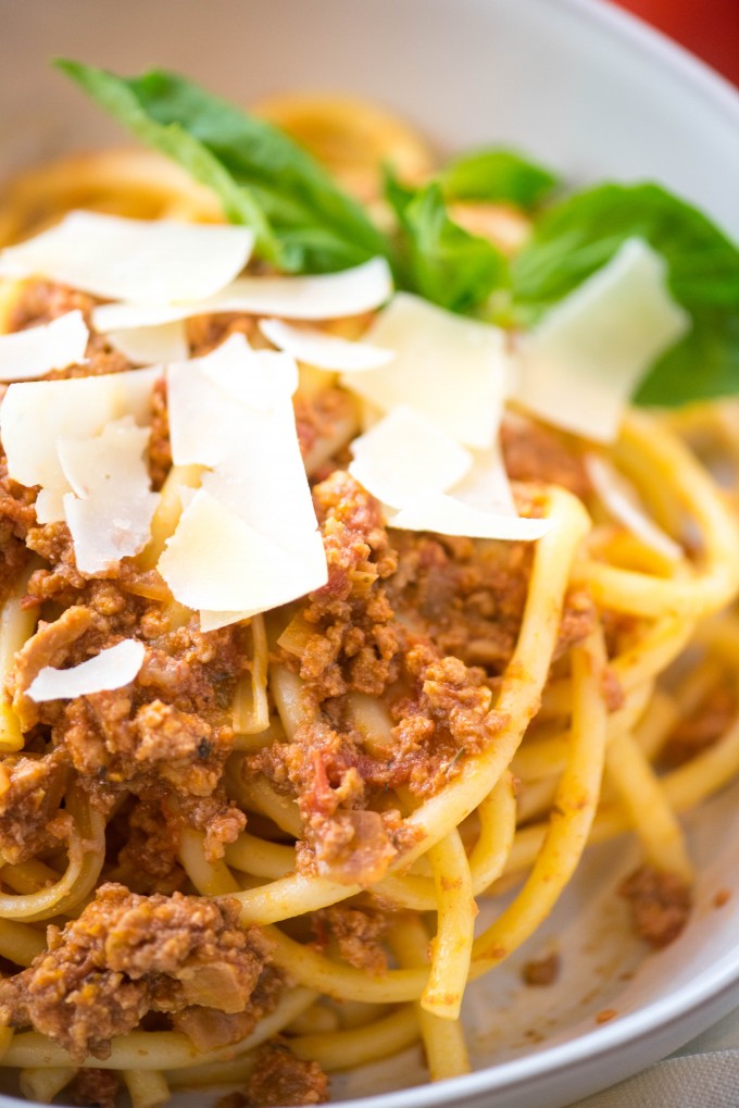 spaghetti bolognese with shaved parmesan