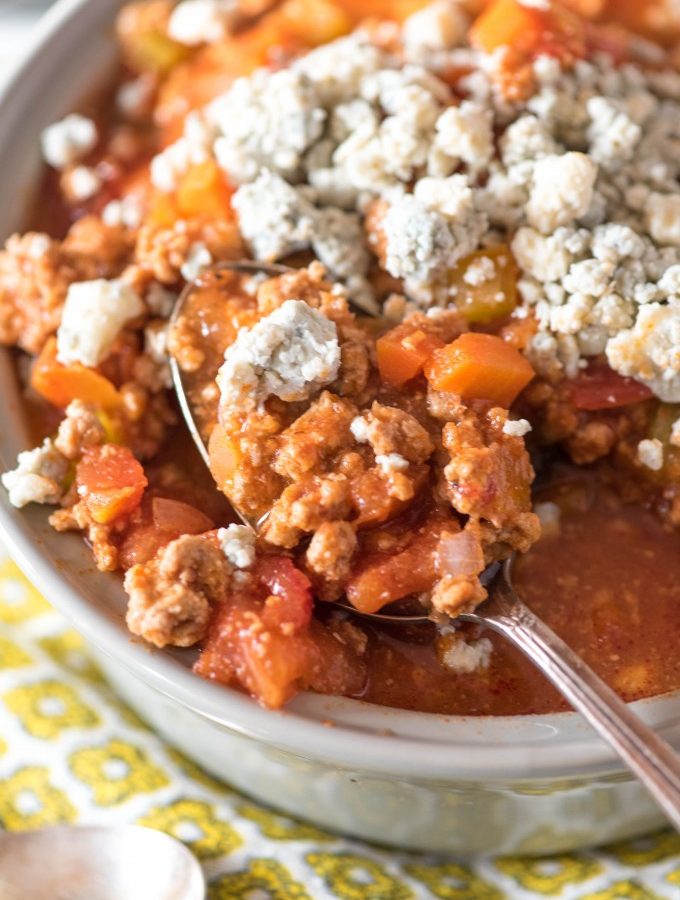 Spoon in bowl of Buffalo Chicken Chili