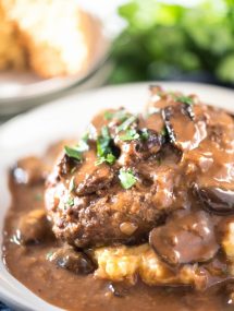 Easy Salisbury Steak recipe on white plate with mashed potatoes
