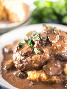 Easy Salisbury Steak recipe on white plate with mashed potatoes