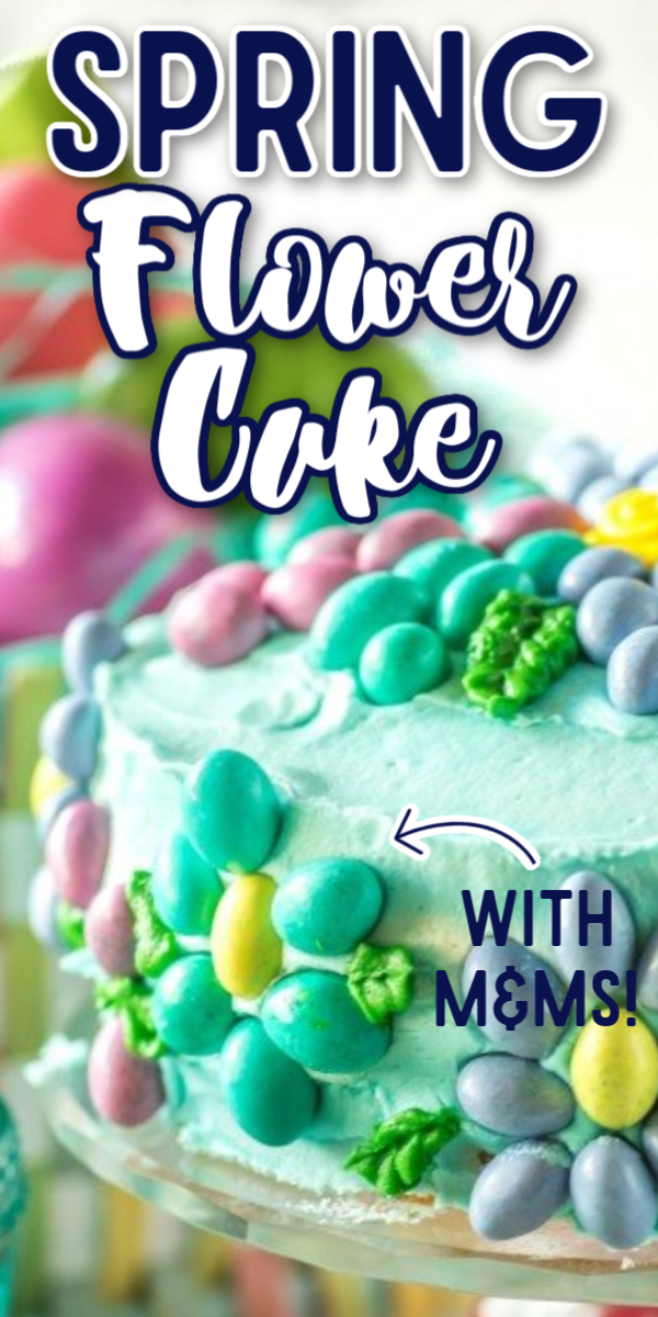 This simple Spring Flower Cake would make the perfect cake for any spring birthday or celebration! This beautiful cake is made easy by using buttercream instead of fondant, and the decorating ideas are endless! #easycaketutorials #springflowercake #easycakedesigns #springdesserts #gogogogourmet via @gogogogourmet