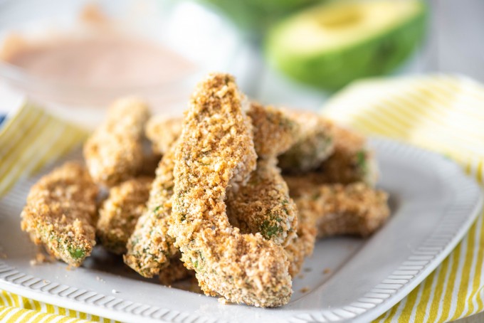 Baked avocado fries on a plate