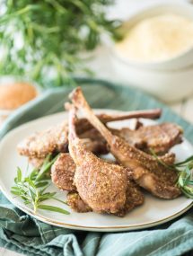 Bone-in pork chop dinner on a plate