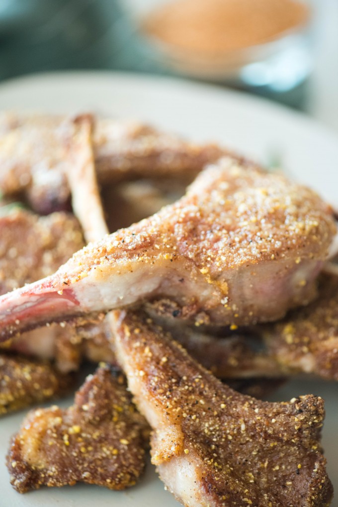 Close up of pan seared lamb chops on a plate