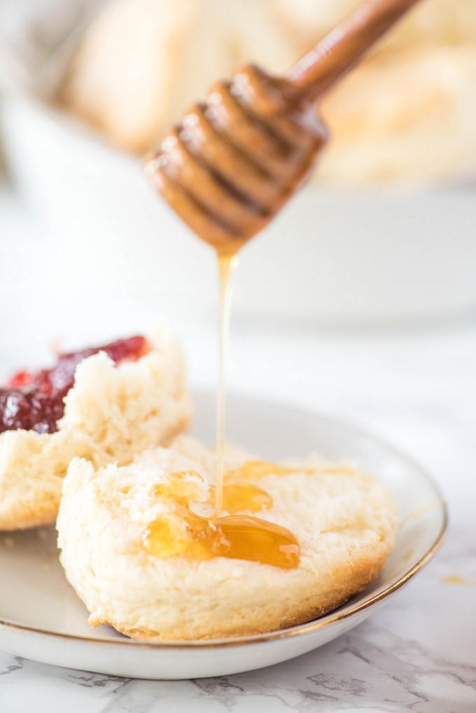 Homemade Buttermilk Biscuits with jam and honey