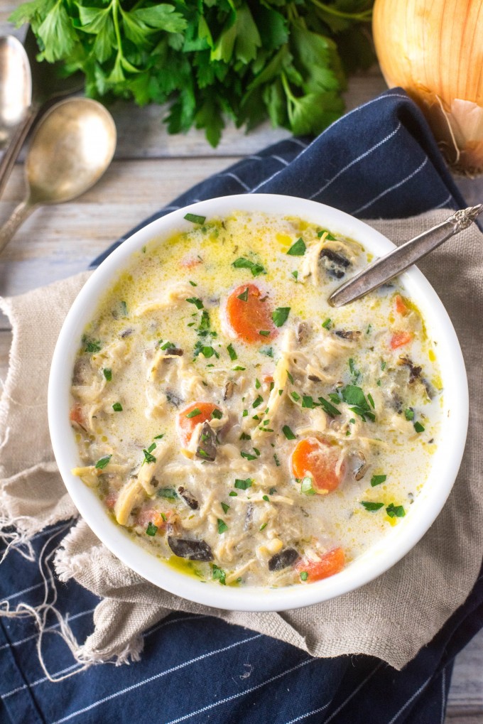 Soup in white bowl with blue napkin