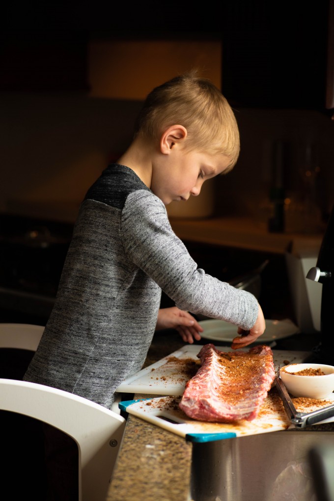 Seasoning ribs with a dry rub before cooking in Instant Pot