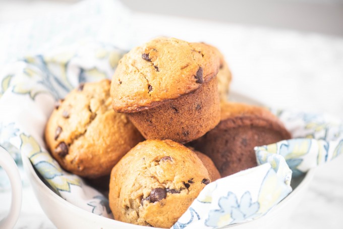 A basket full of the best banana chocolate chip muffins