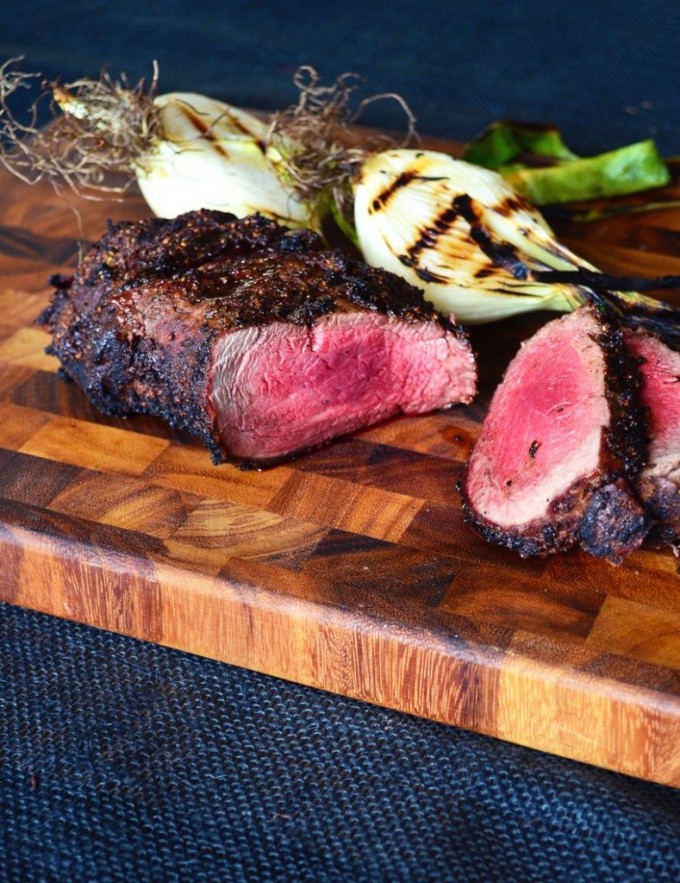 Grilled beef tenderloin on a cutting board