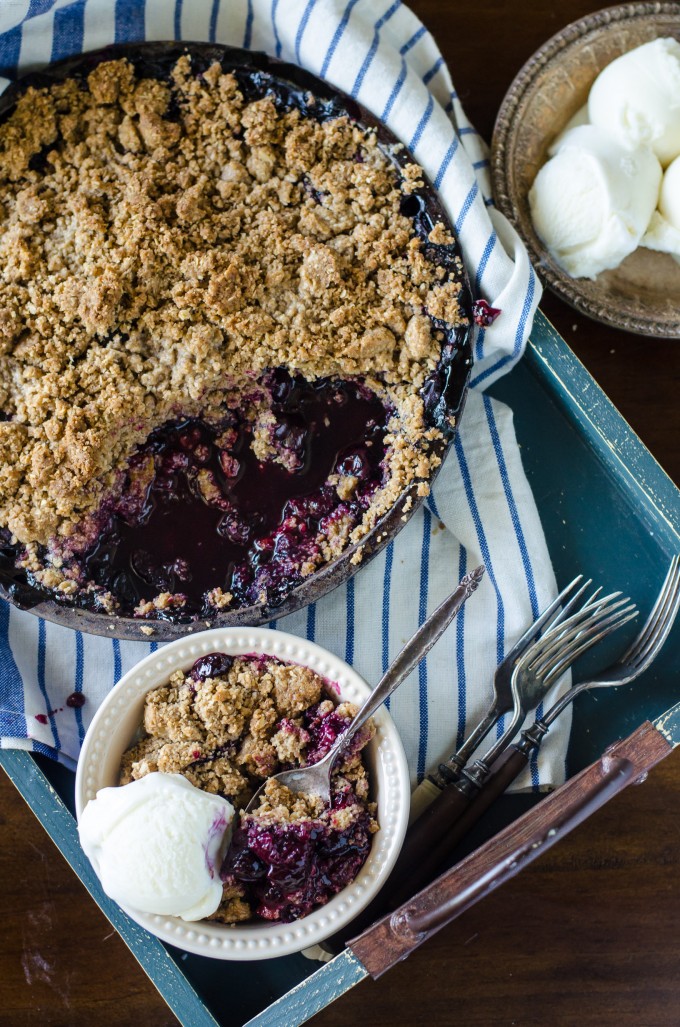 Blueberry crisp in a cast iron skillet