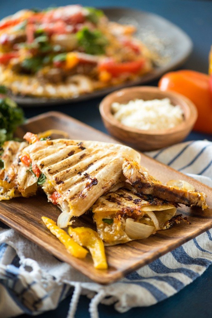 Grilled chicken panini on a platter