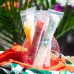 Prosecco popsicles in a bowl