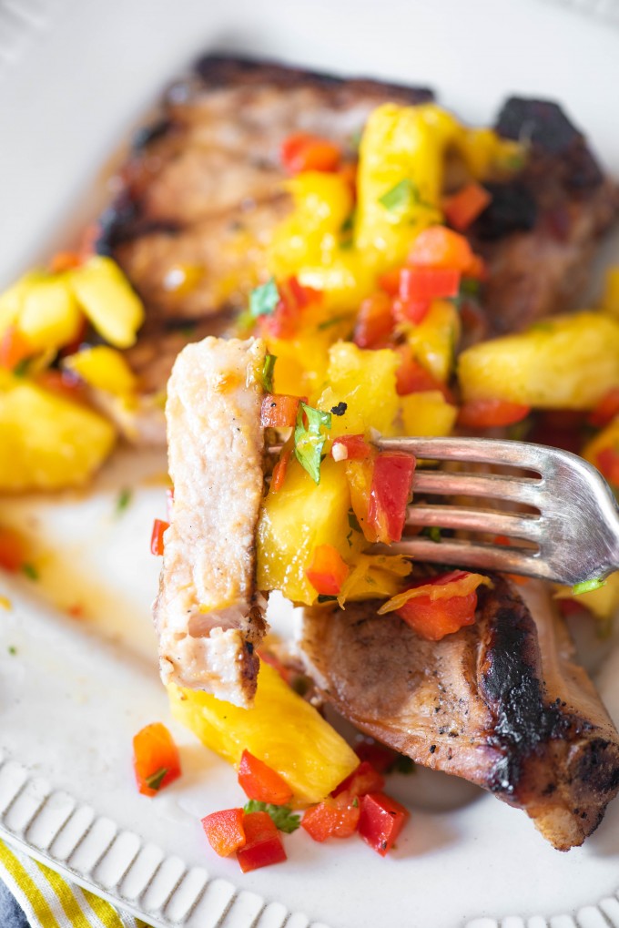 Juicy grilled bone in pork chops with pineapple salsa