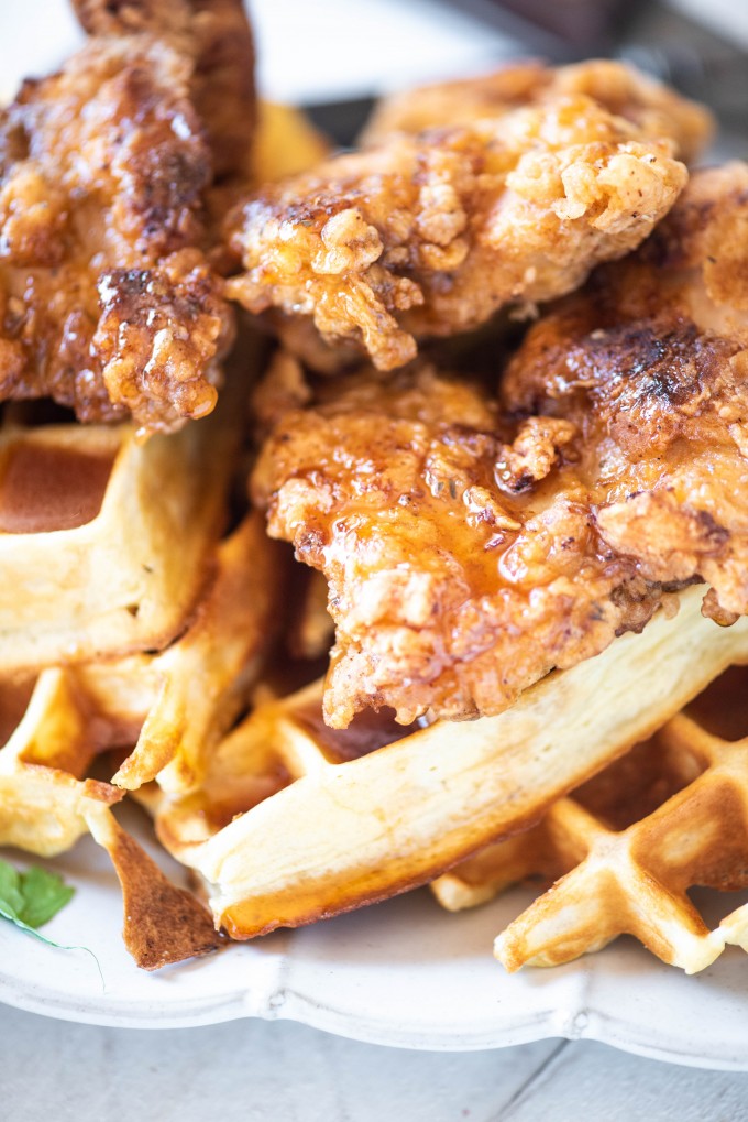 Sriracha honey drizzled on Chicken and Waffles