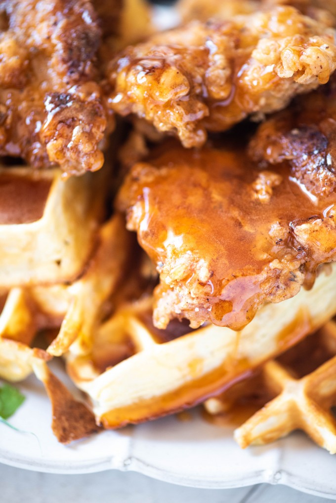 Spicy fried chicken thighs on waffles