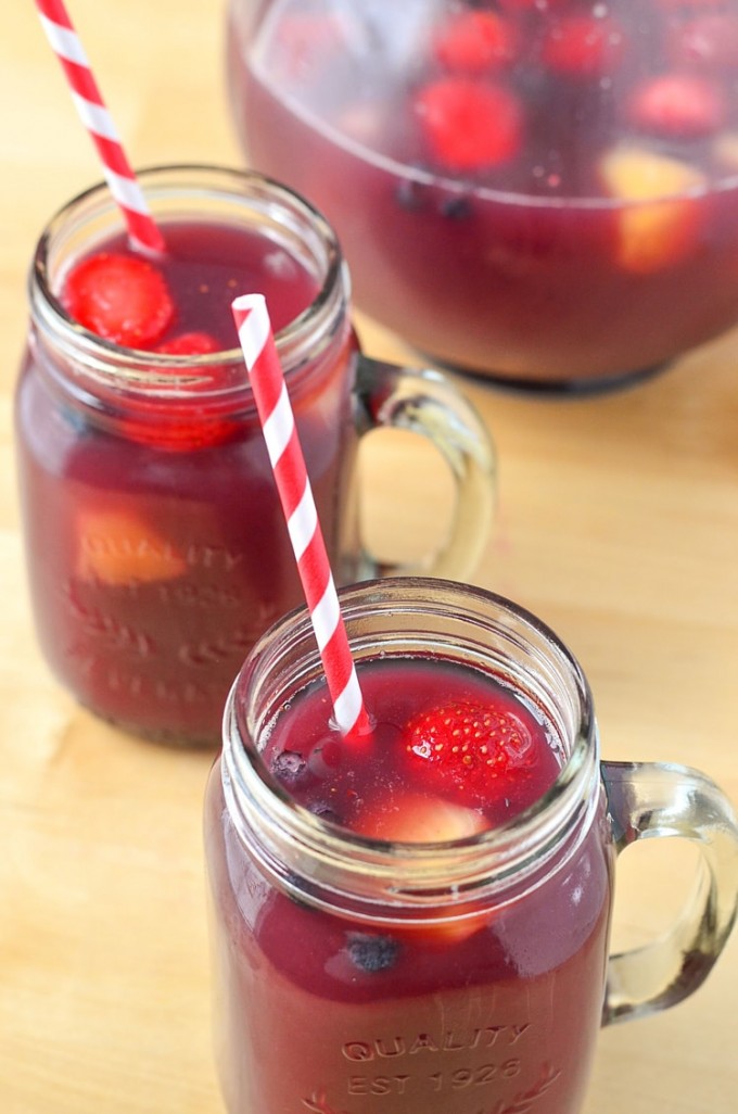 Fruit punch in a mason jar with a straw