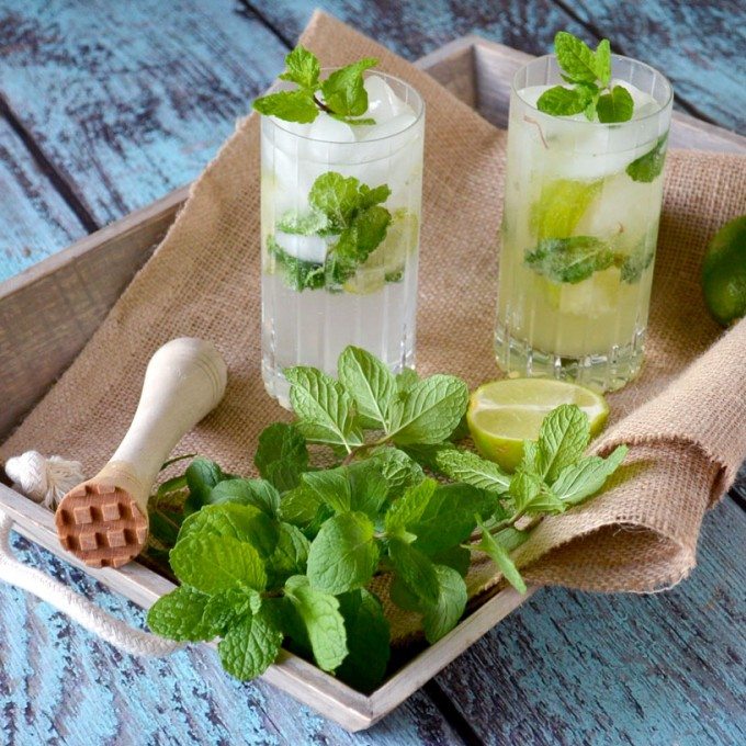 Two limoncello mojitos on a tray