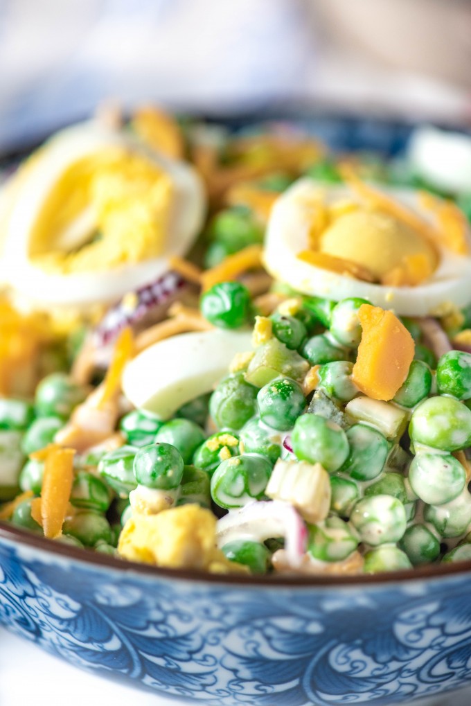 English Pea Salad recipe with creamy peas, red onions, hard boiled eggs
