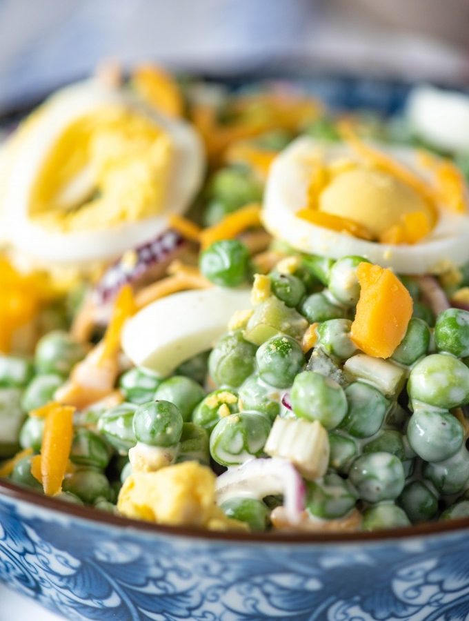 English Pea Salad recipe with creamy peas, red onions, hard boiled eggs